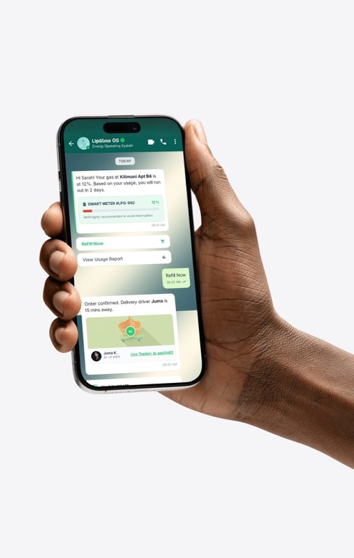 PAYG Smart Meters, front exterior, camera in use to capture group selfie, next to Lipagas Vertical Models Ultra 3 with Camera Remote app open